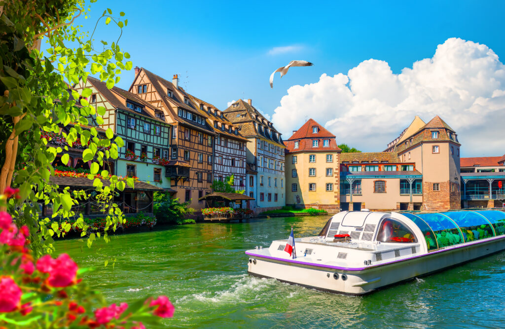 Excursion,Boat,In,River,By,Buildings,In,Strasbourg