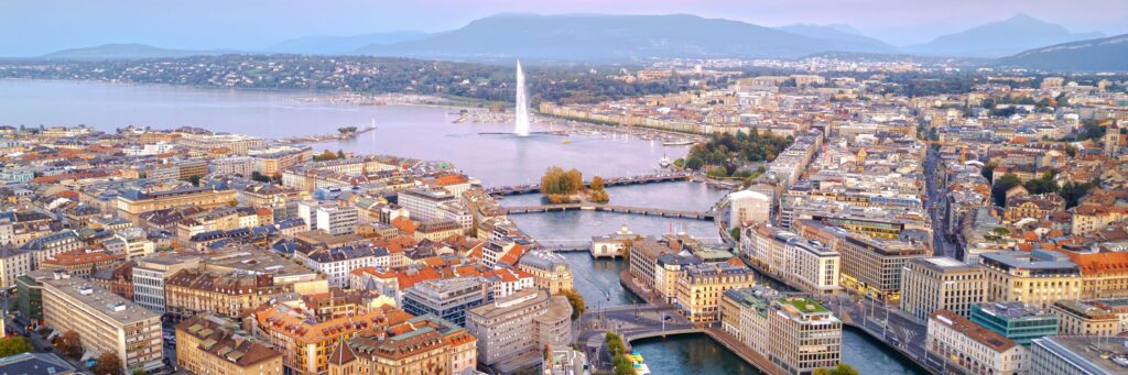 young-austria-staedtereisen-genf-schweiz-skyline-view-jet-deau-fountain-shutterstock-2505065761